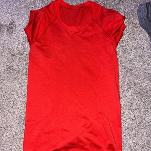 Orangey Red swiftly tech size 6